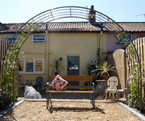 Grey wrought iron and wood garden bench seat, any size